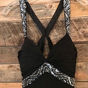 Black backless long formal dress sequin detail.
